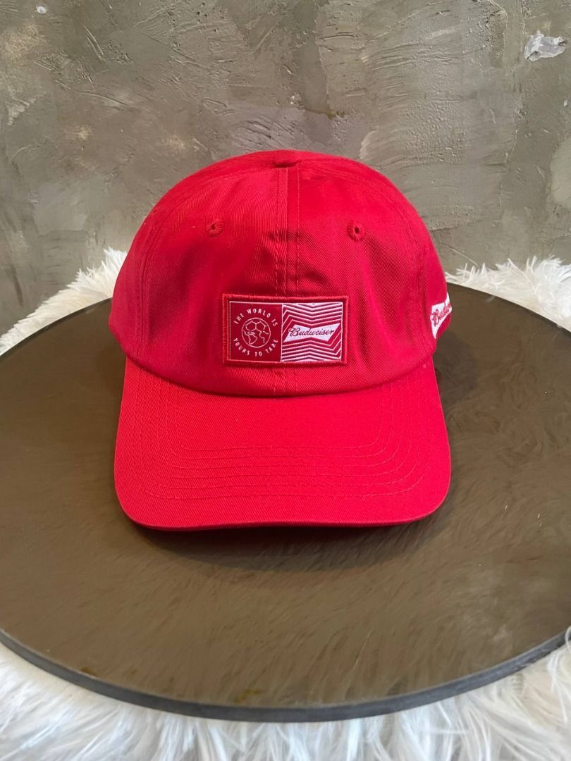 Red Authentic Budweiser Baseball Cap (Category: Caps & Hats) located in Cavite. Submitted by rojanemilpongos (Listing ID 1468621318, Image 2). Description: Classic red Authentic Budweiser cap with adjustable strap. Features iconic logo and 'The world is yours to take' text. Perfect for casual or streetwear style..