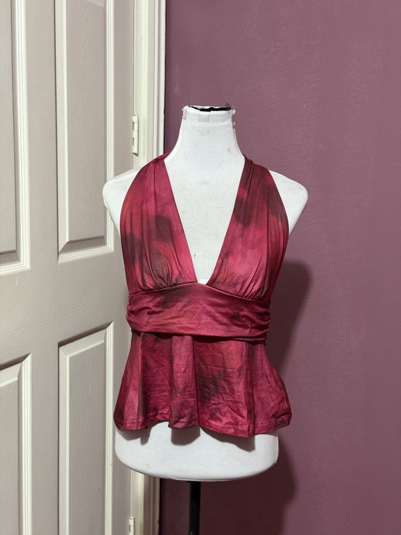 Red bday Halter Top Open Back Flowy Blouse (Category: Sleeveless) located in Manila. Submitted by thatgirl0001 (Listing ID 1468686777, Image 1). Description: - Color/Pattern: Red and dark patterned - Style: Halter top with open back and neck ties - Details: Flattering ruched waist band and flowy flared hem - Fabric: Lightweight and breathable, ideal for PH weather - Condition: Excellent (ready to wear) .