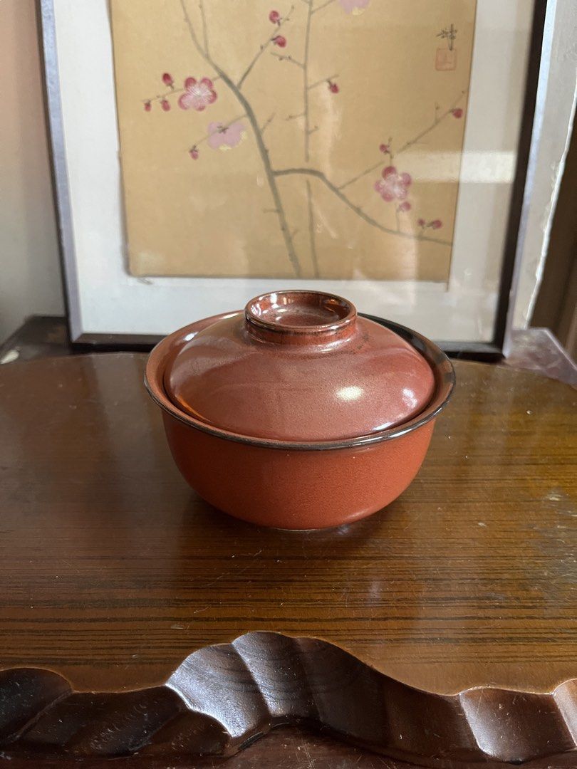 Red Ceramic Bowl with Matching Lid (Category: Dinnerware & Cutlery) located in Taguig. Submitted by minmin_parker (Listing ID 1468535290, Image 2). Description: - Terracotta-toned ceramic bowl with matching lid - Smooth glossy glaze finish with stylish darker rim accents - Ideal size for individual portions of soup, rice, or steamed dishes - Easy to hand wash - Versatile design that matches various kitchen aesthetics.
