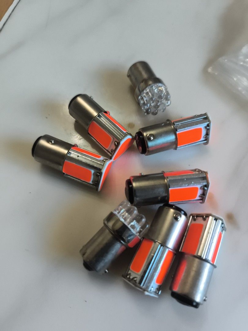 Red COB and LED car light bulbs bundle set (Category: Lighting) located in Cavite. Submitted by Combiishop (Listing ID 1468580937, Image 2). Description: - Bundle of assorted car light bulbs - Includes red COB panel bulbs and clear multi-LED cluster bulbs with metal bayonet bases - Packaged together in a convenient clear ziplock bag - 100% unused and brand new - Ideal for DIY vehicle lighting upgrades, replacements, or spares - Meet-up or shippin