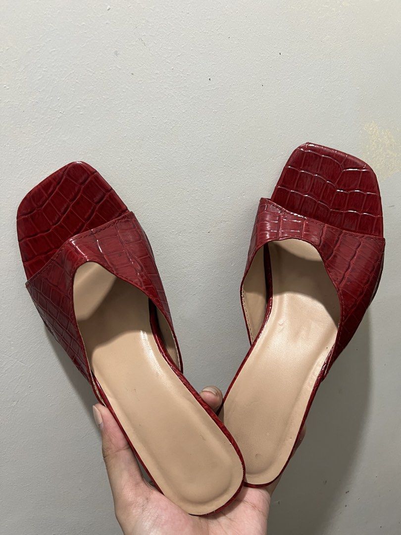 Size 7 Red Croc Embossed Square Toe Mules Heels (Category: Heels) located in Manila. Submitted by 34samf (Listing ID 1468621564, Image 1). Description: - Color: Red - size 7 - Style: Slip-on mules with square toe and flare heel - Texture: Faux crocodile - Heel Height: 2.5” heel - Condition: Soles show previous wear, clean insole, and a minor crack on the right shoe's heel wrap Location: Manila📍.