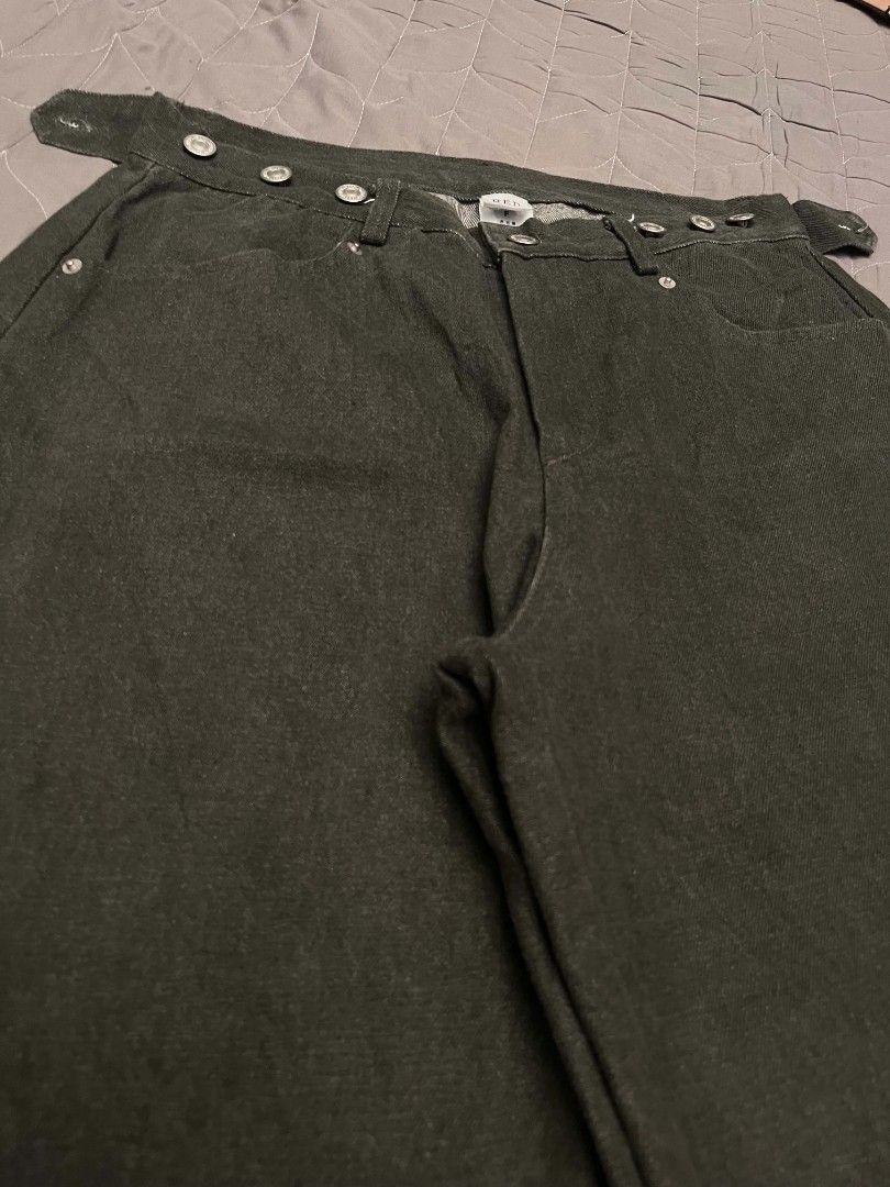 RED Dark Green Raw Denim Pants (Category: Jeans) located in Manila. Submitted by safelion-a2982f (Listing ID 1468603953, Image 2). Description: Dark green denim pants from RED. Wide leg cut with structured waistline and unique metal button accents across the front waistband. Two back pockets with button details and a brown leather patch on the back. Sturdy fabric, clean hems. Ready to wear. DIMES W(27-33) adjustable buttons L(41) T(15) H(10.5) .