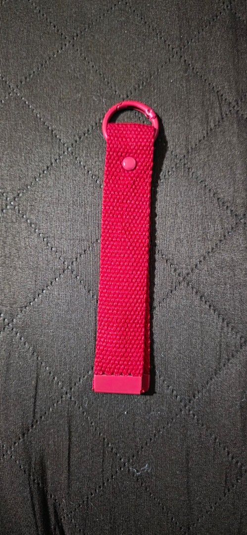 Red fabric keychain lanyard with snap button (Category: Character Goods) located in Tanauan. Submitted by jcang5 (Listing ID 1468612178, Image 1). Description: .