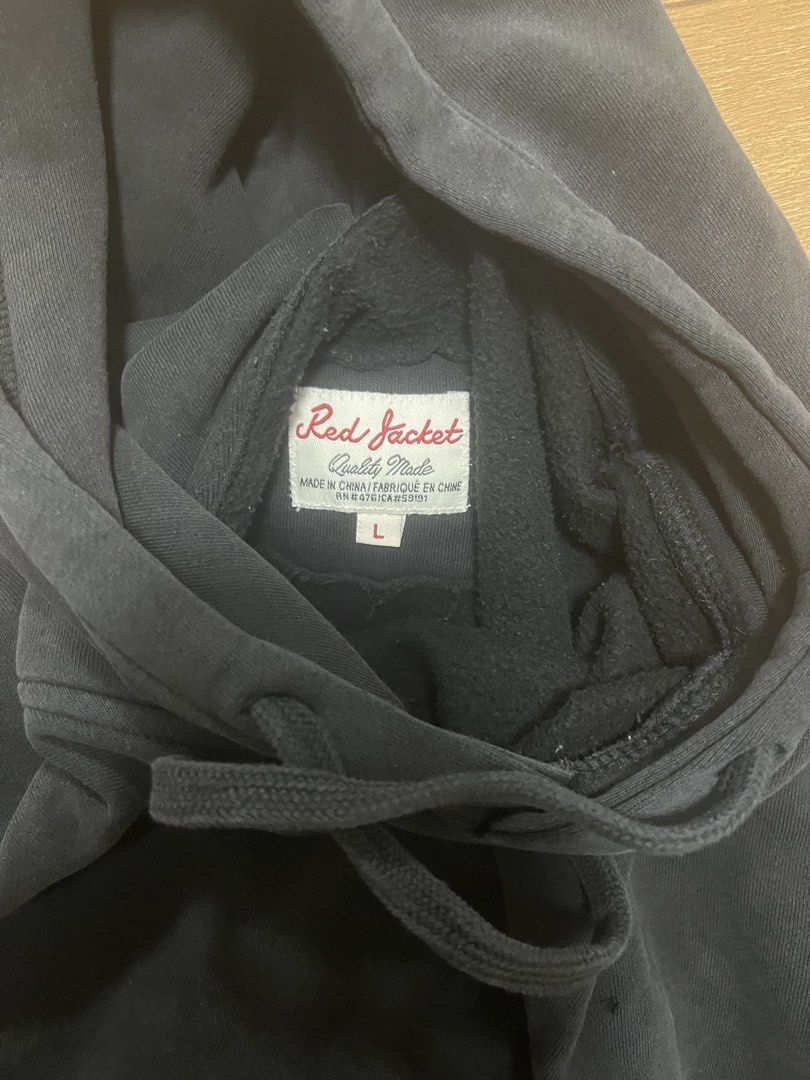 Red Jacket Quality Made Hoodie Size L (Category: Coats, Jackets and Outerwear) located in Abucay. Submitted by iellifinds (Listing ID 1468593506, Image 2). Description: - Brand/Model: Red Jacket Quality Made - Size: Large - Color: Solid Black - Material: Soft fleece interior for extra warmth - Features: Front pouch pocket and adjustable drawstrings - Condition: Normal signs of wash and wear throughout - Style: Casual everyday pullover.