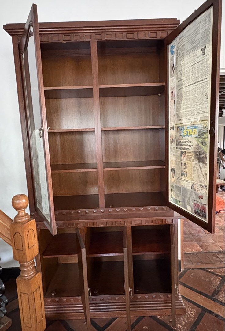 Red Narra China Cabinet and Buffet Table (Category: Shelves, Cabinets & Racks) located in Quezon City. Submitted by jennybug (Listing ID 1468591876, Image 3). Description: Red narra two-piece China cabinet and buffet table. China cabinet: Solid wood build with glass doors on top section and lots of shelving inside and in lower cabinets. Dimensions: 4ft (length) X 20in (width) x 7ft 2in (height). Buffet Table: Cabinets and pull-out drawers for sto