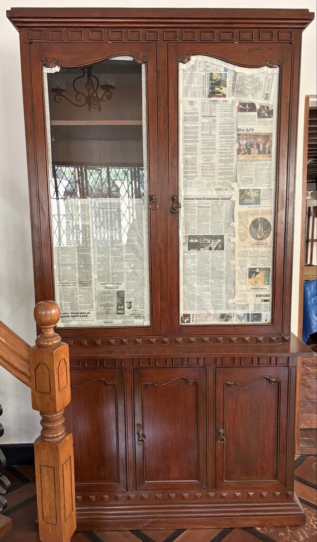 Red Narra China Cabinet and Buffet Table (Category: Shelves, Cabinets & Racks) located in Quezon City. Submitted by jennybug (Listing ID 1468591876, Image 1). Description: Red narra two-piece China cabinet and buffet table. China cabinet: Solid wood build with glass doors on top section and lots of shelving inside and in lower cabinets. Dimensions: 4ft (length) X 20in (width) x 7ft 2in (height). Buffet Table: Cabinets and pull-out drawers for sto