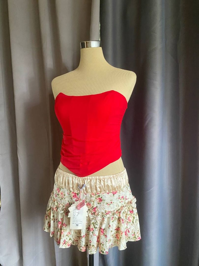 Red Strapless Lace-Up Corset Top (Category: Sleeveless) located in Cagayan de Oro. Submitted by curated_closetph (Listing ID 1468555347, Image 2). Description: — Size: M - L — Color: Red — Ruched stretch fabric — Strapless bandeau neck — Lace-up grommet back — Pointed asymmetrical hem — Side zipper closure — Can negotiate the price — 🛒 Shop more to get more discounts and freebies!.
