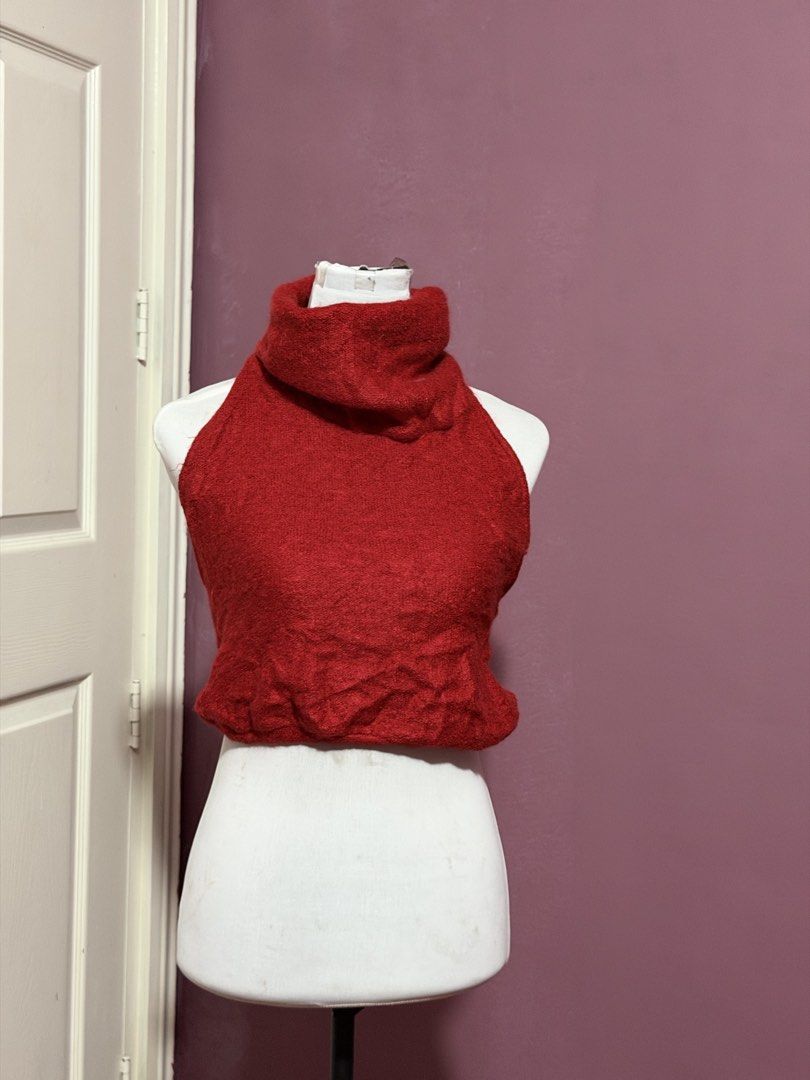 Red Turtleneck Halter Open Back Top (Category: Sleeveless) located in Manila. Submitted by thatgirl0001 (Listing ID 1468593531, Image 1). Description: - Color: Bright red - Style: Halter turtleneck crop top - Design: Sleeveless with a fuzzy knit texture - Fit: Stretchy, comfortable material ending at the waist - Versatility: Perfect for layering over long sleeves or wearing solo.