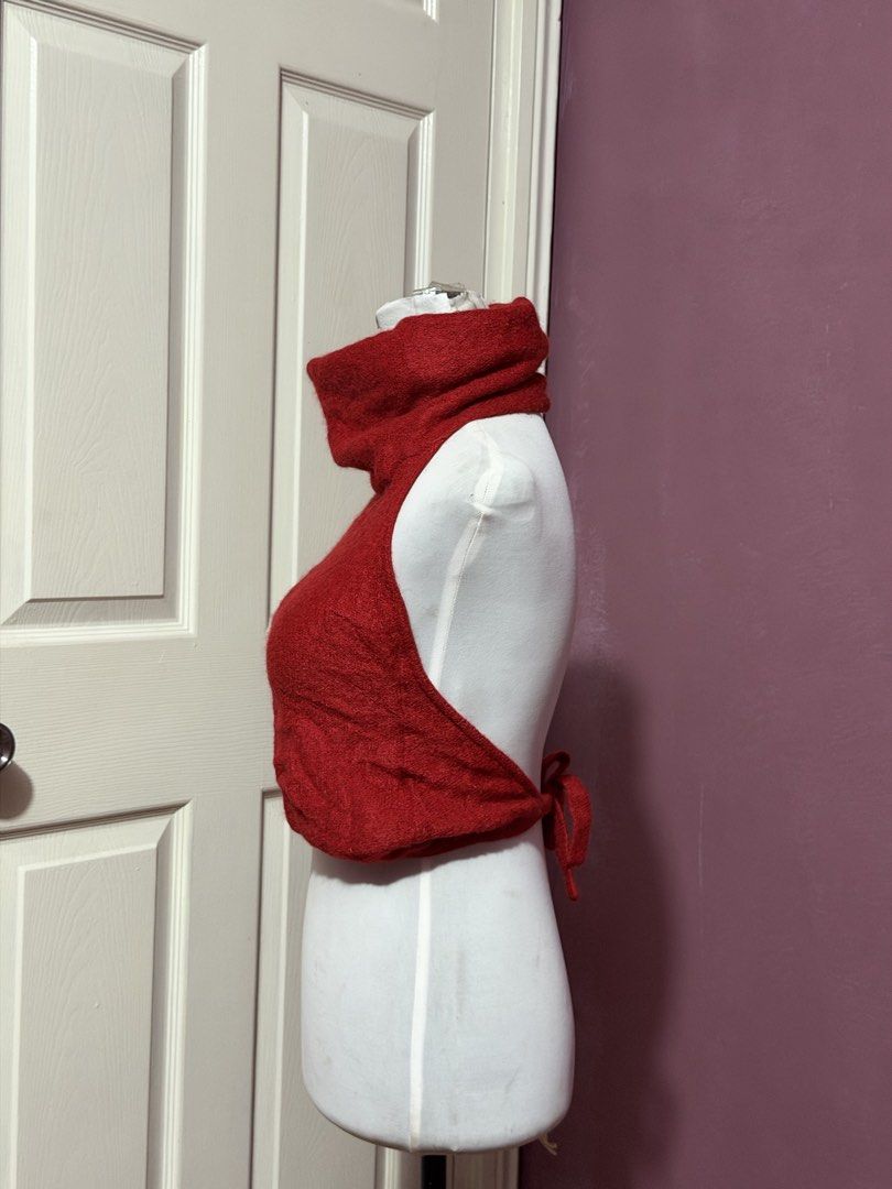 Red Turtleneck Halter Open Back Top (Category: Sleeveless) located in Manila. Submitted by thatgirl0001 (Listing ID 1468593531, Image 3). Description: - Color: Bright red - Style: Halter turtleneck crop top - Design: Sleeveless with a fuzzy knit texture - Fit: Stretchy, comfortable material ending at the waist - Versatility: Perfect for layering over long sleeves or wearing solo.