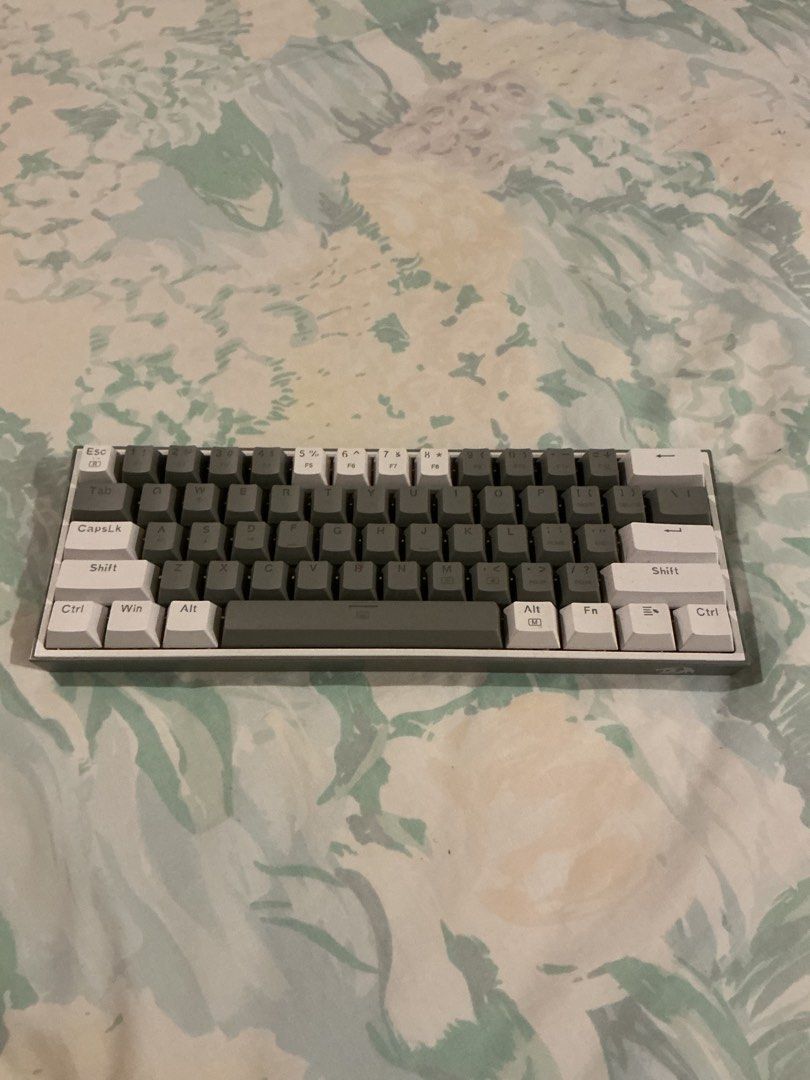 Redragon K617 (Category: Computer Keyboard) located in Muntinlupa City. Submitted by antonrizz (Listing ID 1468634908, Image 2). Description: - Model: Redragon Fizz Mechanical Keyboard (Grey & White colorway) - Layout: Compact 60% layout, perfect for minimalist setups - Switches: Dust-proof red switches, smooth for gaming and typing - Lighting: Customizable RGB backlighting - Connectivity: Wired connection - Condition: Barely used, super clean ke
