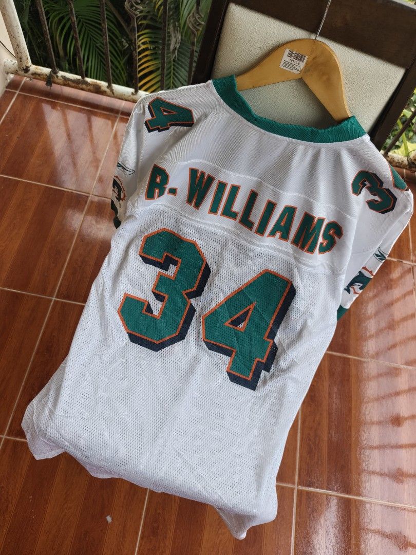 Reebok Miami NFL Dolphins #34 Ricky Williams (Category: Tshirts & Polo Shirts ) located in San Isidro. Submitted by goldendogs (Listing ID 1468546012, Image 2). Description: Reebok Miami NFL Dolphins #34 Ricky Williams Reebok Hard tag Medium on tag Needs wash Prestine condition Dm 📥 #NFL.