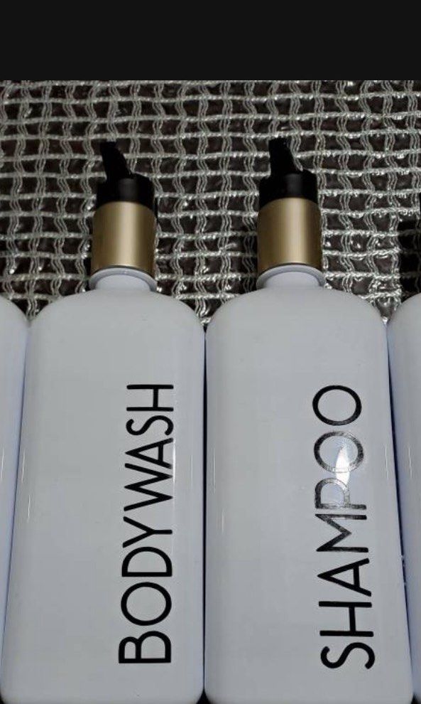 Refillable Shampoo and Body Wash Pump Bottles Set (Category: Breastfeeding & Bottle Feeding) located in Paranaque City. Submitted by shopmycloset_pretty.mercy (Listing ID 1468538109, Image 3). Description: - Set of 2 empty pump bottles for shampoo and body wash - Clean white rectangular design with modern black lettering - Elegant gold-tone collars and sleek black pump heads - Perfect for decanting bulk products to achieve a neat, minimal aesthet