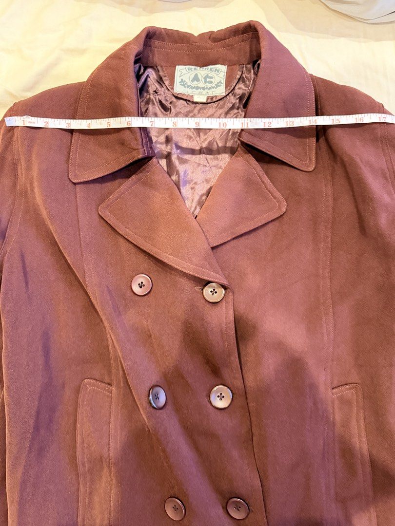 Renren Double-Breasted Brown Coat (Category: Coats, Jackets and Outerwear) located in Bacoor. Submitted by caramelcart (Listing ID 1468632551, Image 2). Description: - Used once - Style: Double-breasted coat with front buttons and pockets and shoulder pads - Color/Lining: Brown with a silky brown interior lining - Fit & Measurements: Shoulder width measures approx. 17 inches - Fits L - XL - Features: Collared neckline and long sleeves - Ideal For