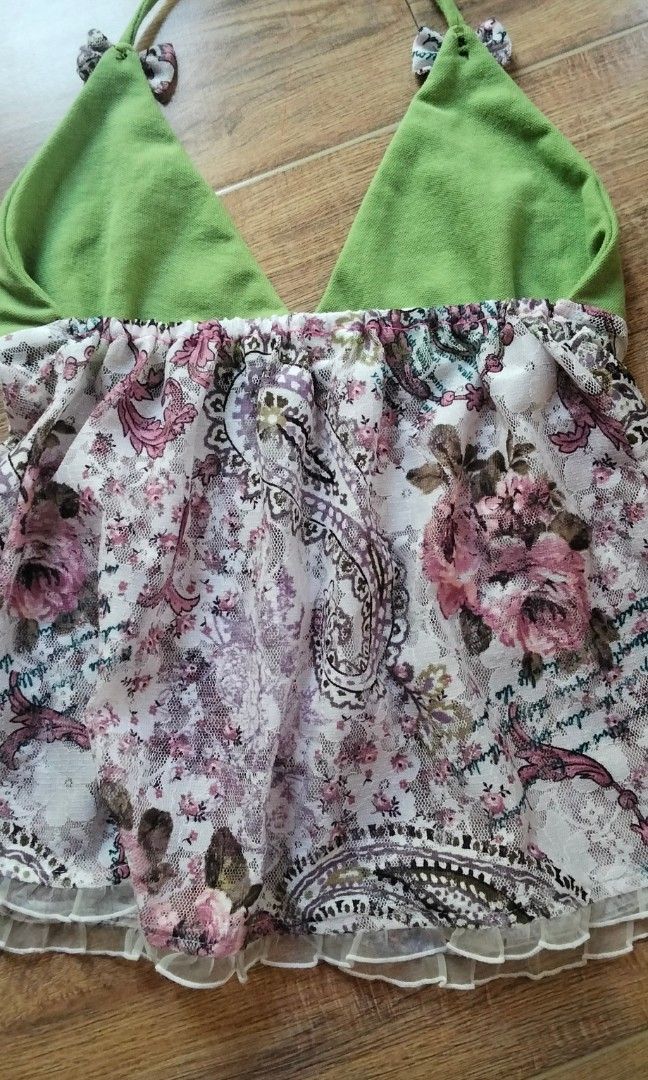Reworked backless halter top, hand sewn (Category: Sleeveless) located in Santa Cruz. Submitted by chrysan_025 (Listing ID 1468558747, Image 3). Description: It has opening closure at the front. fits Small to Medium *the green pieces is cotton fabric from gildan polo shirt * the pink Paisley is like mesh net..