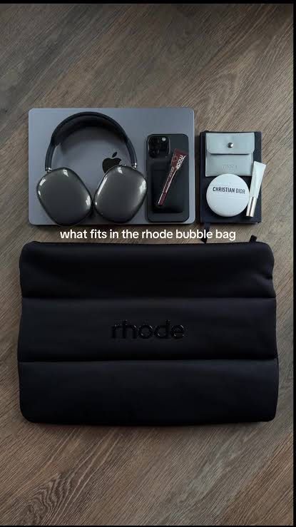 Rhode Black Bubble Bag Puffer Clutch (Category: Purses & Pouches) located in Taytay. Submitted by angeltyyyy (Listing ID 1468502328, Image 1). Description: SUPER CUTE 😭😭😭 authentic, complimentary gift from Rhode ✨ will keep if no one wants (lowkey sana walang kumuha kasi nag iisa nalang to HAHA) 😂💗 yung mini palang nito (the yellow one) retails for 3k+ sa rhode website + matagal nang sold out 😭😅 loc: Commonwealth, QC, can also ship from ta