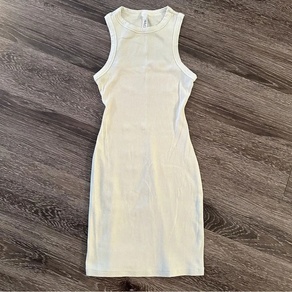 Ribbed knit bodycon (skims)S (Category: Dresses) located in Lucena. Submitted by shoplingmood (Listing ID 1468664194, Image 1). Description: Bone stretch-cotton jersey Slips on 95% cotton, 5% elastane.