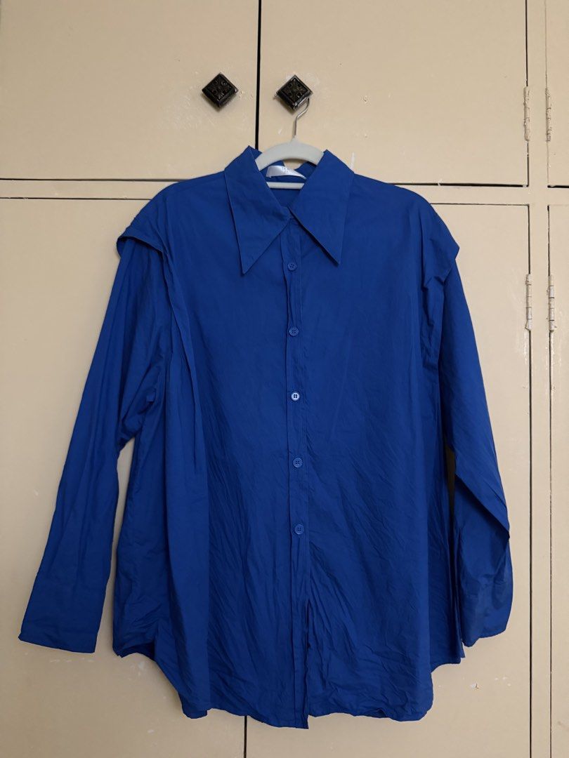 Rich blue longsleeves button down top (Category: Longsleeves) located in Quezon City. Submitted by sufjanxcx (Listing ID 1468686621, Image 1). Description: Negotiable Size S-L Very rich blue color Unique shape.