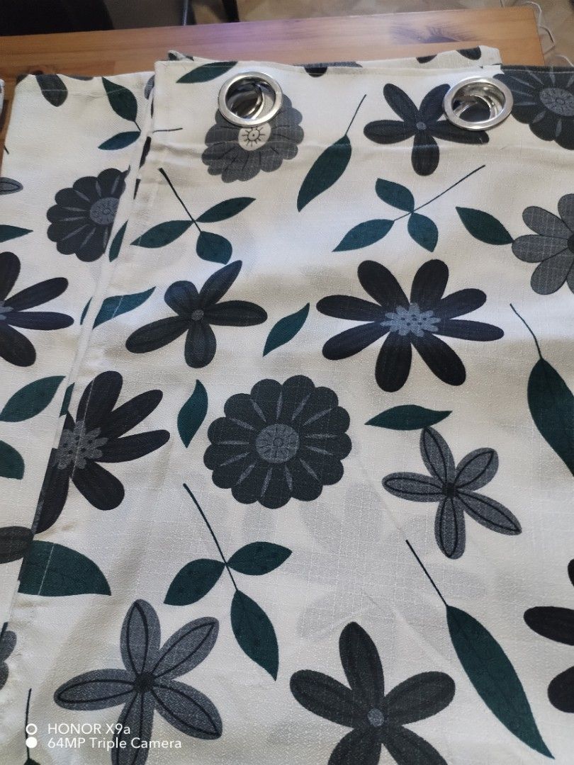 Ring Curtains 4 Panels ( 56 x 70 inches) (Category: Curtains & Blinds) located in Muntinlupa City. Submitted by arciagamaryann68 (Listing ID 1468556249, Image 3). Description: - Type: Ring Curtains (4 Panels) - Size: 56 x 70 inches per panel - Design: Elegant floral and leaf pattern in gray and dark green on white - Features: Convenient built-in metal rings for easy installation - Condition: Excellent, clean, and ready to use local made.