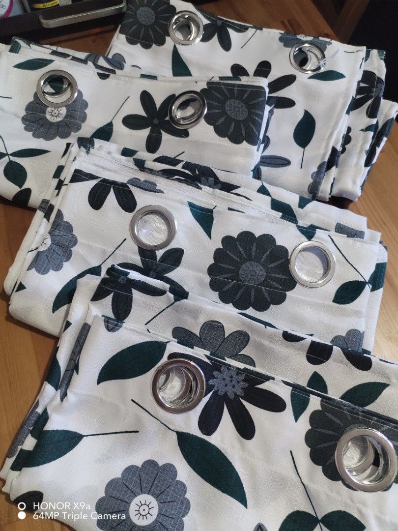 Ring Curtains 4 Panels ( 56 x 70 inches) (Category: Curtains & Blinds) located in Muntinlupa City. Submitted by arciagamaryann68 (Listing ID 1468556249, Image 1). Description: - Type: Ring Curtains (4 Panels) - Size: 56 x 70 inches per panel - Design: Elegant floral and leaf pattern in gray and dark green on white - Features: Convenient built-in metal rings for easy installation - Condition: Excellent, clean, and ready to use local made.