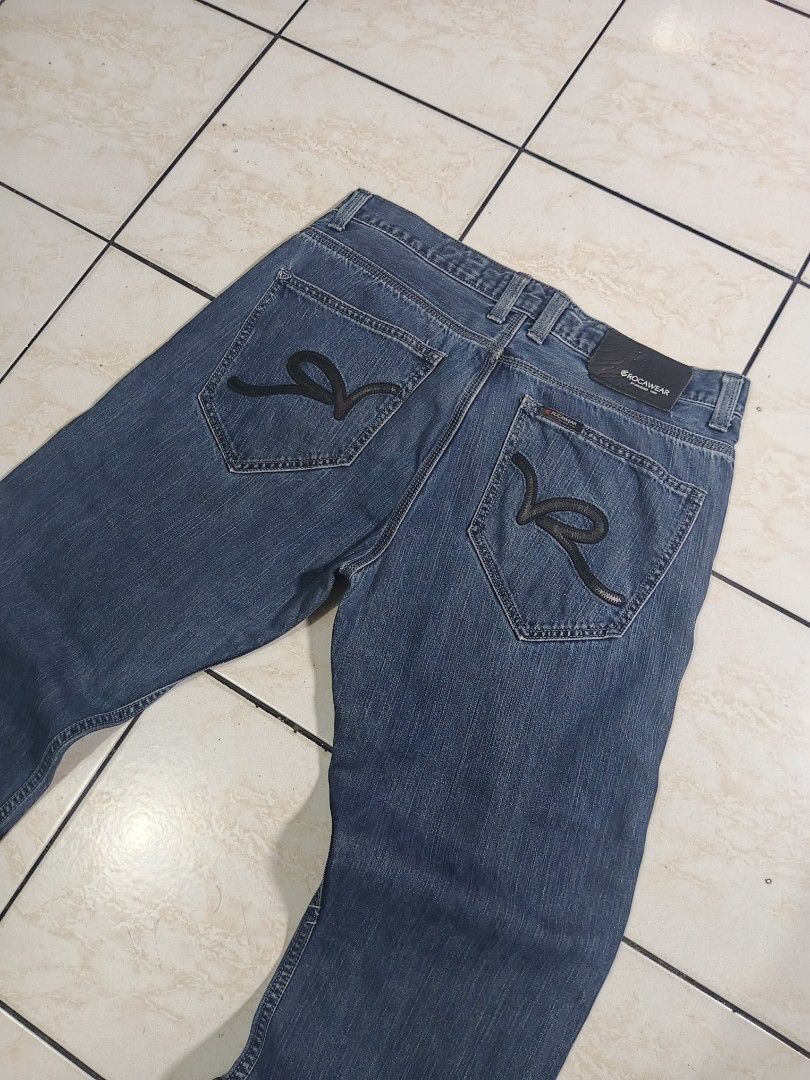ROCAWEAR PANTS (Category: Jeans) located in Taguig. Submitted by wst.fnds (Listing ID 1468686585, Image 2). Description: ROCAWEAR LIGHT BLUE WASH GOOD CONDITION BAGGY / LOOSE LEATHER DESIGN CHECK PIC FOR MINIMAL ISSUE W:35 / L:40/ T:13.5 / LO:8.5 💸: 499 Keywords: Southpole, Fubu, Karl kani, Rocawear, Evisu, Rmc, Ed Hardy, Sean John, Ecko Unltd, Coogi, Girbaud, Avirex, Ralph Lauren.