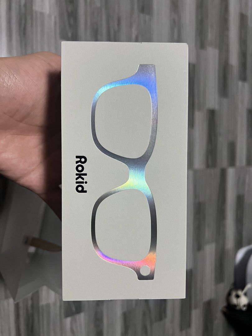 Rokid Glasses AR Smart Glasses (Category: Sunglasses & Eyewear) located in Manila. Submitted by thegreyhousemarket (Listing ID 1468689874, Image 2). Description: - Brand: Rokid (Model RV101) - Condition: Brand new, factory-sealed, unopened retail box - Processor: Powered by Snapdragon AR1 platform - Compatibility: Made for iPhone (Supports iPhone 16 down to older generations) - Power Input: 5V 1A - Manufacturer: Linban Technology - Perfect for im