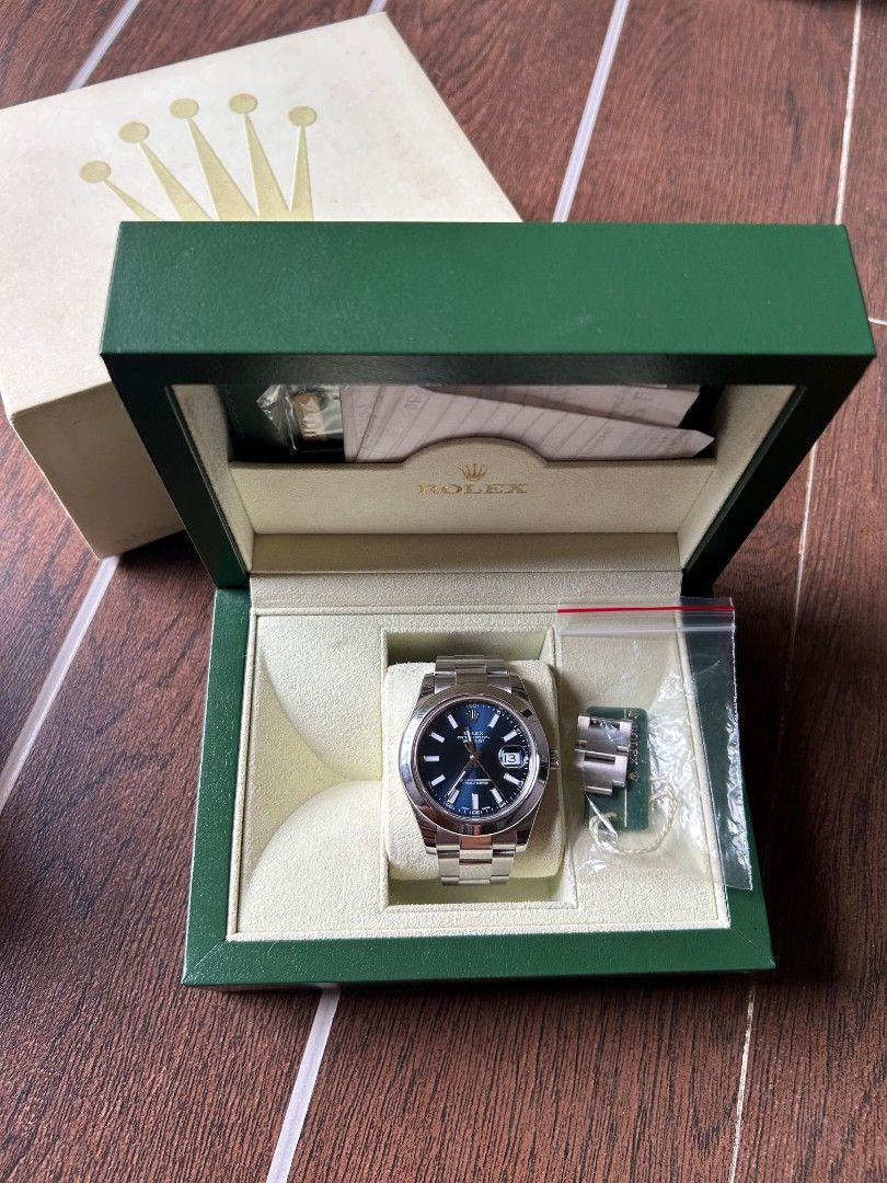 Rolex Datejust II 116300 Blue Dial (Category: Luxury Watches) located in Caloocan City. Submitted by cocobitz_ (Listing ID 1468549087, Image 3). Description: Selling my Rolex Datejust 2 - Blue Dial - 116300 - Year 2013 - Used but not abused - Retail Ready - Complete set, Local AD Meetups Anywhere around Metro Manila, Qc, NCR Price is negotiable .