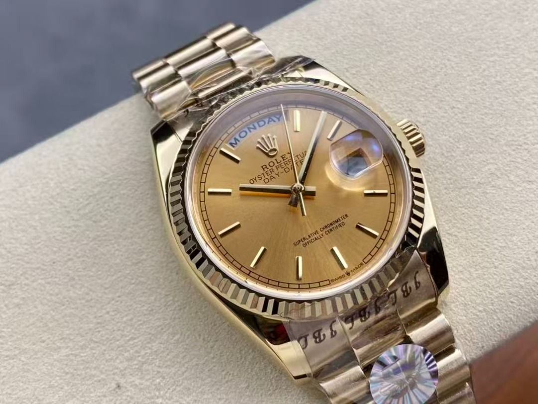 Rolex Day-Date Gold Watch (Category: Luxury Watches) located in Pateros City. Submitted by purebird_714be0 (Listing ID 1468576823, Image 2). Description: - Model: Rolex Day-Date - Material: Full Gold with matching President bracelet - Dial: Champagne dial with baton markers, day at 12, and date at 3 with cyclops lens - Bezel: Iconic fluted bezel - Condition: Brand new, factory plastic wrap still attached on case and bracelet - Authentication: Ori