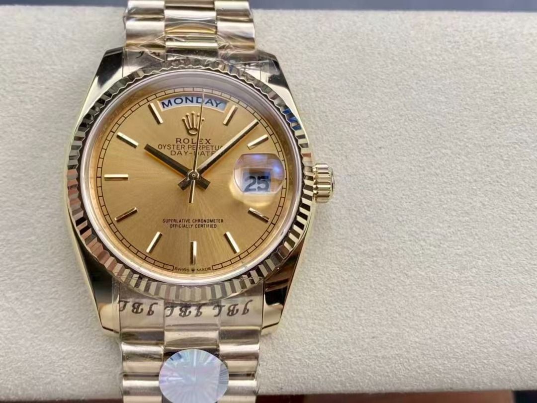 Rolex Day-Date Gold Watch (Category: Luxury Watches) located in Pateros City. Submitted by purebird_714be0 (Listing ID 1468576823, Image 1). Description: - Model: Rolex Day-Date - Material: Full Gold with matching President bracelet - Dial: Champagne dial with baton markers, day at 12, and date at 3 with cyclops lens - Bezel: Iconic fluted bezel - Condition: Brand new, factory plastic wrap still attached on case and bracelet - Authentication: Ori