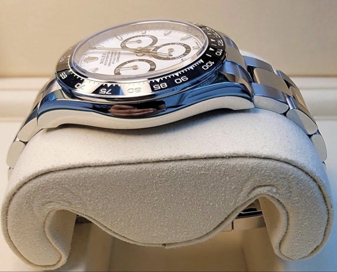 Rolex Daytona Panda 126500LN White (Category: Watches) located in Singapore. Submitted by triple999 (Listing ID 1468665954, Image 3). Description: * Authentic Rolex Daytona Watch * White Dial * Full Stainless Steel Bracelet * Original Green Box * International Guarantee Card * Still under warranty * Watch date: 01/2025 * Bought brand new via a reputable dealer * Originally from The Hour Glass * Original receipt from a renowned dealer and Hour Gla