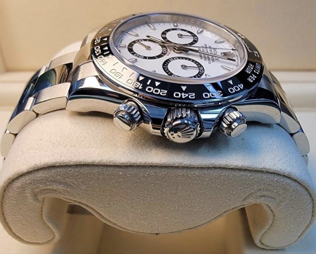 Rolex Daytona Panda 126500LN White (Category: Watches) located in Singapore. Submitted by triple999 (Listing ID 1468665954, Image 2). Description: * Authentic Rolex Daytona Watch * White Dial * Full Stainless Steel Bracelet * Original Green Box * International Guarantee Card * Still under warranty * Watch date: 01/2025 * Bought brand new via a reputable dealer * Originally from The Hour Glass * Original receipt from a renowned dealer and Hour Gla