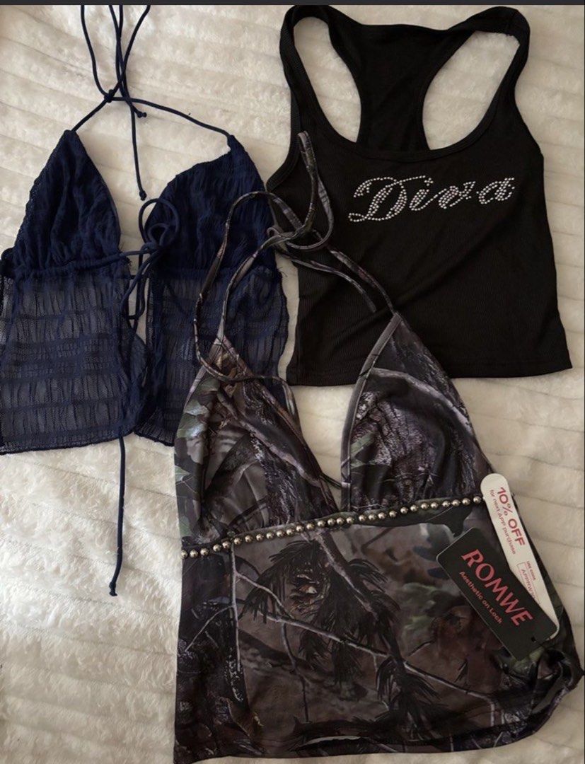 Romwe Camo Halter Top & Dark Blue Mesh Top Bundle (Category: Sleeveless) located in Quezon City. Submitted by hadescloset (Listing ID 1468536143, Image 1). Description: - Bundle of 3 cute Y2K-style tops sold as a set - Top 1: Romwe camo print halter top (Brand New with Tags) - Top 2: Dark blue sheer mesh tie-front halter top with ruffled edges - Top 3: Black ribbed racerback tank top with rhinestone 'Diva' lettering - Perfect for building your ae