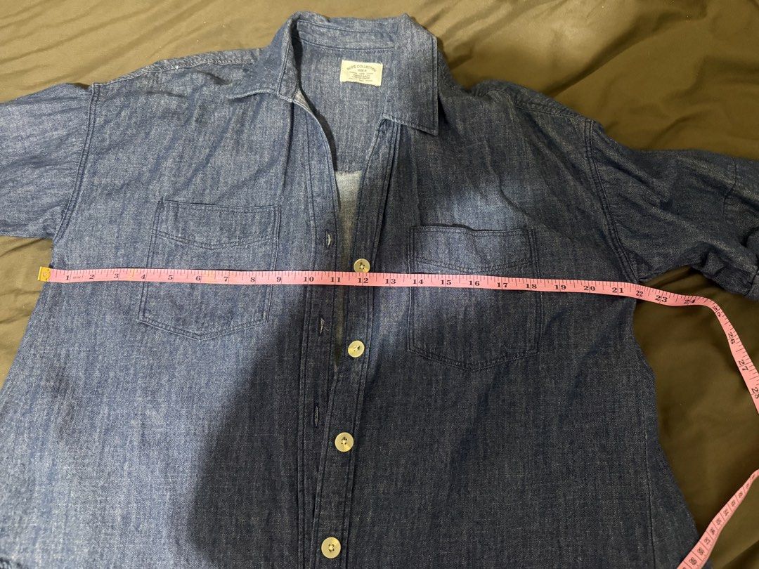 Rope Collection Denim Button-Down Shirt Size Large (Category: Shirts) located in Quezon City. Submitted by turtleandfishes (Listing ID 1468628603, Image 2). Description: - Brand: Rope Collection - Style: Denim shirt with short sleeves and folded cuffs - Color: Medium blue - Details: Classic button-down front with light-colored buttons, two chest pockets, and a curved hemline - Size: Medium (M) - Measurements: ~23 inches chest width, ~26 inches le