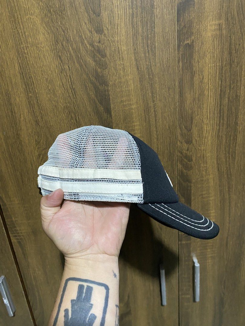 Roxy Trucker Cap Black White (Category: Caps & Hats) located in Antipolo. Submitted by cogiestamaria (Listing ID 1468653639, Image 2). Description: - Brand: Roxy - Color: Classic Black and White - Design: Embroidered heart logo on front panel with white mesh back - Fit: Adjustable snapback closure, Size 58cm - Details: Branded tape along inner seams - Condition: Great for sunny outdoor days and casual surf style.