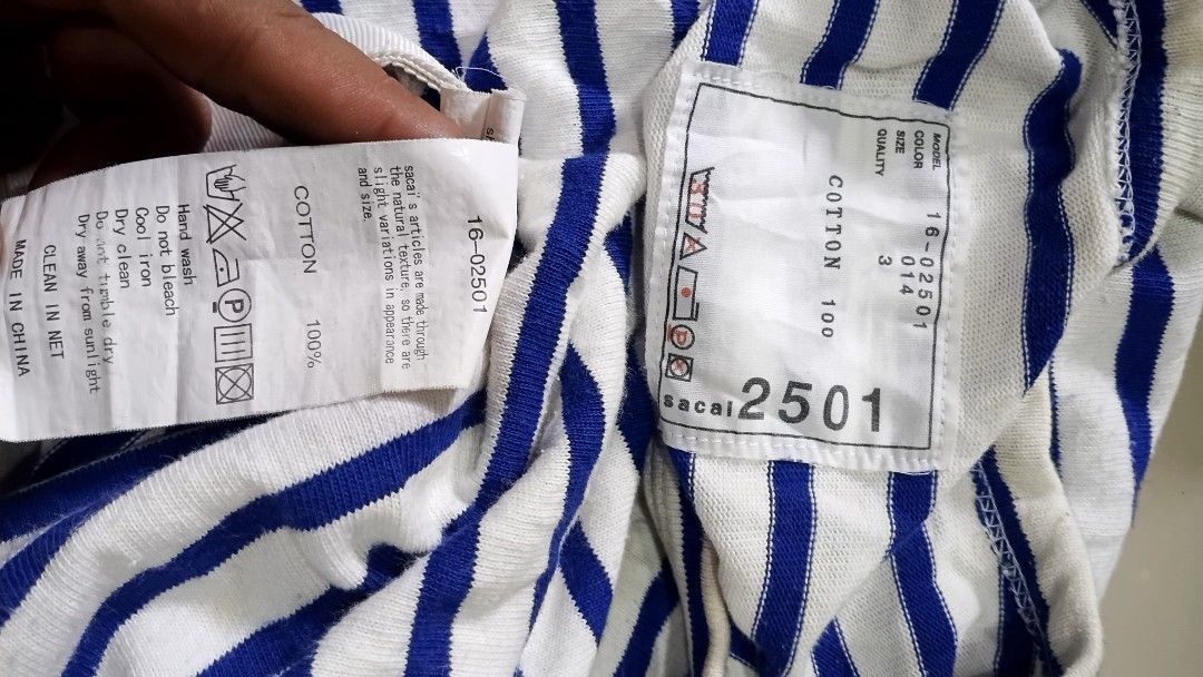 Sacai Pocket tee (Category: Shirts) located in Bacolod City. Submitted by cadizthrifter (Listing ID 1468551713, Image 2). Description: Sacai pocket tee authentic dimes 22'⁵x27 good condition.