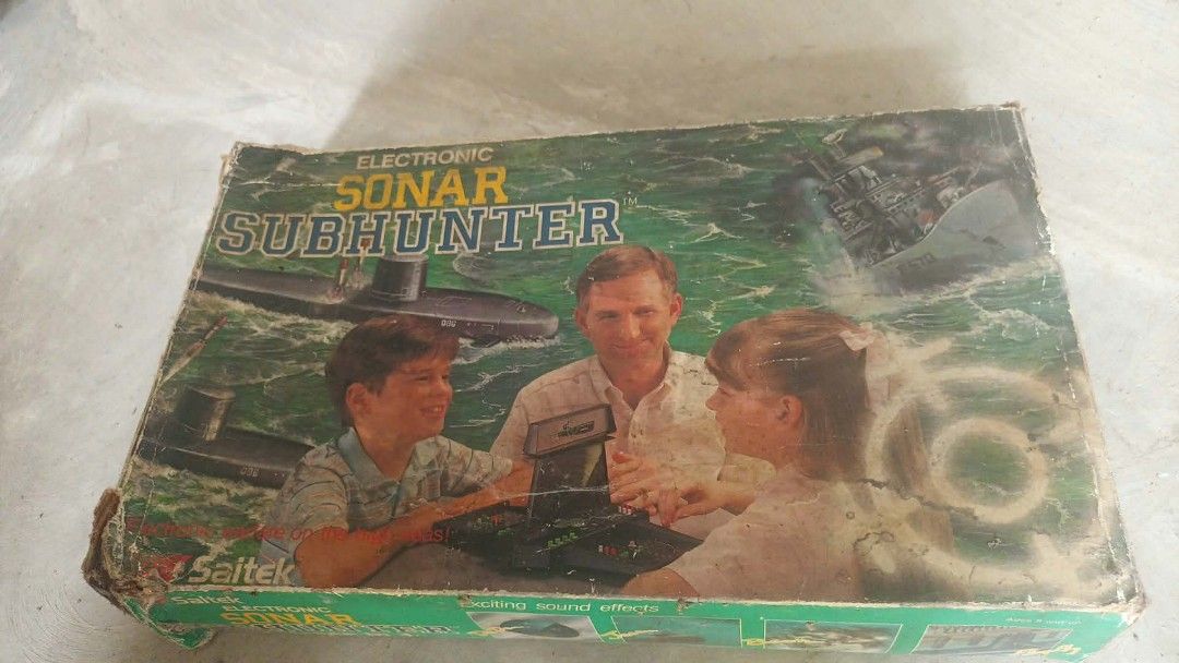 Saitek Electronic Sonar Subhunter Vintage Retro Board Game (Category: Board Games & Puzzles) located in Mandaluyong City. Submitted by LEATHERFACE (Listing ID 1468550955, Image 1). Description: - Retro 1980s Saitek electronic board game - Sonar Subhunter theme complete with sound effects - Rare, hard-to-find vintage collectible for strategy game fans - Box shows heavy wear, creases, and edge damage from long-term storage - Tested and working clas