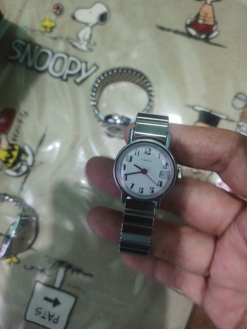 Sale Bundle! Timex Automatic Watches (Category: Women's Watches) located in Rizal. Submitted by yves1211 (Listing ID 1468650424, Image 2). Description: - Brand: Timex - Round white automatic watches with bold black numbers and a date - Second Hand: Distinctive red second hand - Case & Band: Durable silver-tone metal case with an easy-on stretch expansion band - Feature: Water-resistant design - Condition: Great everyday timepiece, hassle-free fit