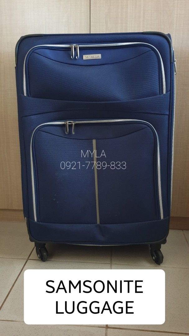 Samsonite Blue Spinner Luggage Suitcase (Category: Luggage) located in Lucena. Submitted by lucenasecondhanditems (Listing ID 1468680751, Image 1). Description: - Authentic Samsonite luggage in classic navy blue - Smooth 360-degree spinner wheels for easy mobility - Adjustable telescoping handle plus top and side carry handles - Quick-access front zipper pockets - Secure interior packing straps and zippered mesh compartments - Spacious and durabl