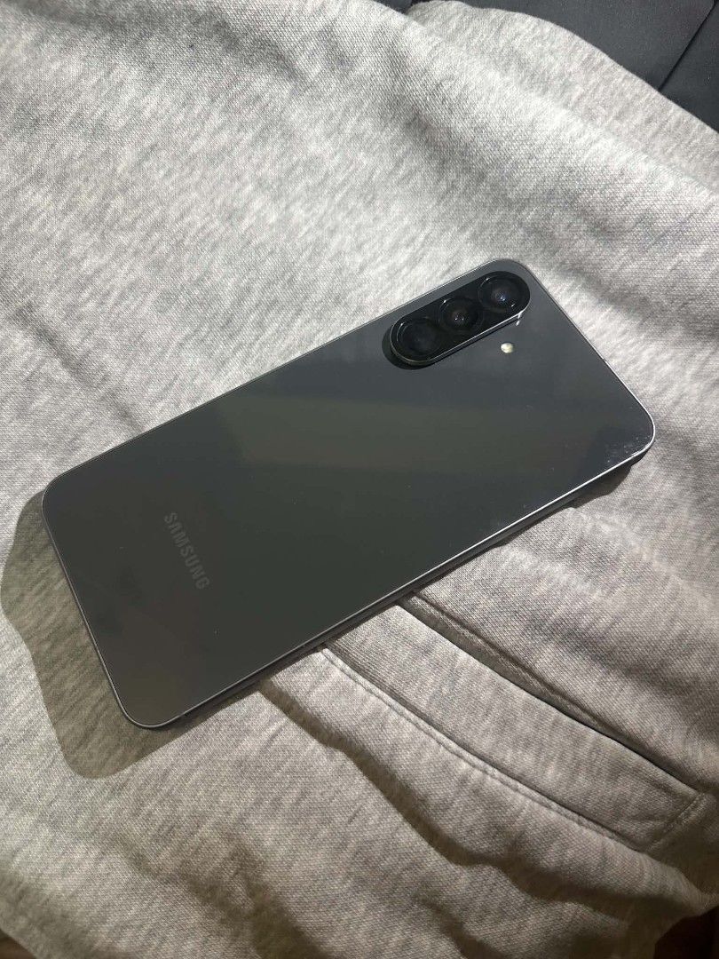 Samsung A56 5G 256GB (Category: Samsung) located in Manila. Submitted by newtiger_4396d9 (Listing ID 1468677642, Image 2). Description: Last Post 15k... Rush Price Today 12K for Sure Buyer Today - Brand/Model: Samsung A56 5G - Storage: 256GB - Color: Graphite - Good As New - 100% Good Condition - Condition: Excellent, Smooth Screen and Body.
