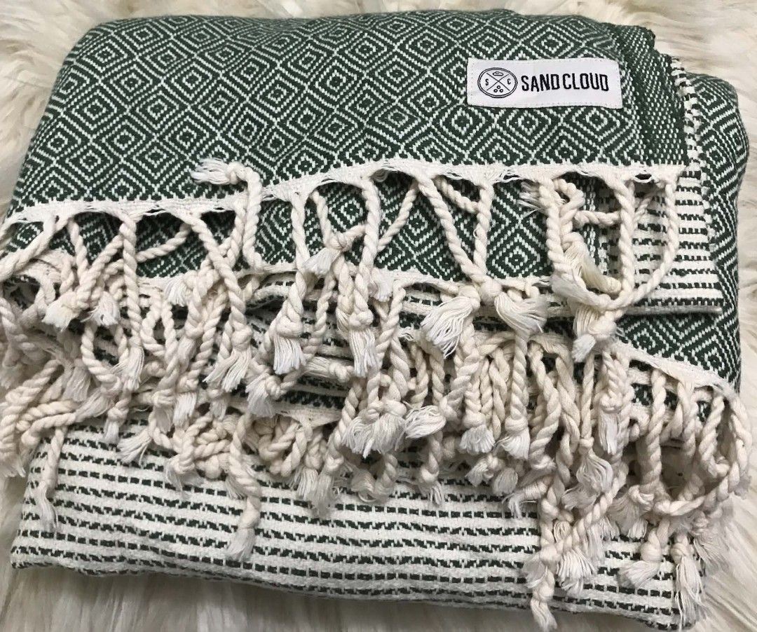 Sand Cloud Turkish Organic Cotton Green Diamond Pattern (Category: Bedding & Towels) located in Imus. Submitted by stop_shop7 (Listing ID 1468548563, Image 1). Description: - Authentic Sand Cloud in forest green and white - Material: 100% Turkish organic cotton, made in Turkey - Design: Traditional diamond geometric pattern with a striped top and twisted fringe trim - Features: Soft textured weave, lightweight, and highly absorbent.