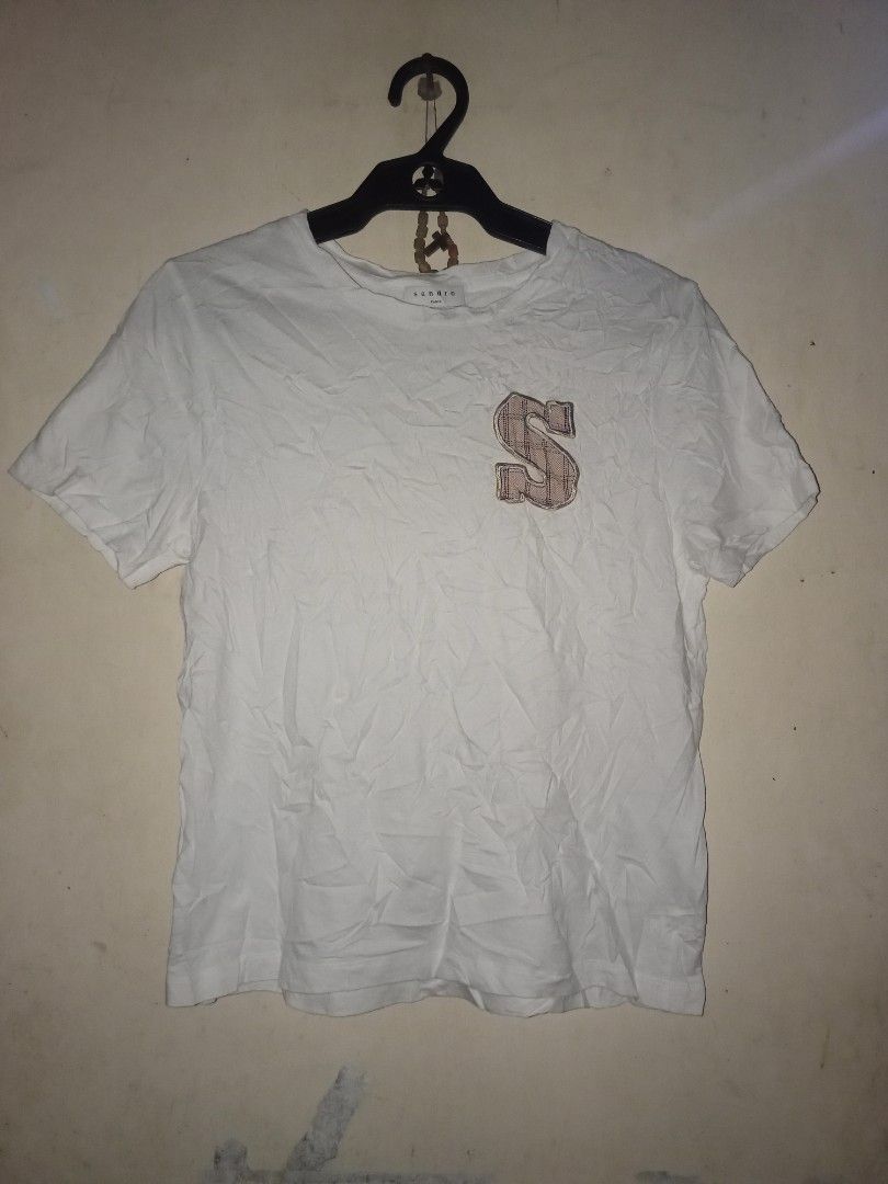 Sandro paris women shirt (Category: Shirts) located in Manila. Submitted by kenny200024 (Listing ID 1468647854, Image 1). Description: Sandro paris women shirt - small - actual measurement width 17 | length 22 - very good condition - need wash only | fresh from bale.