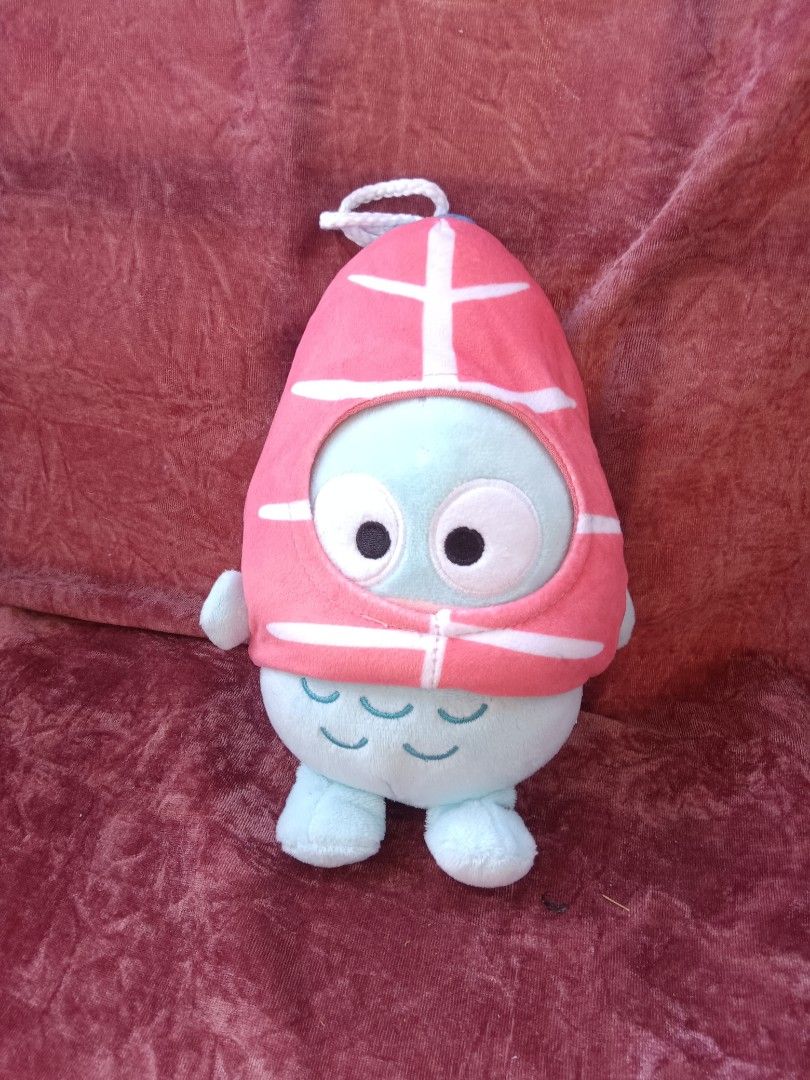 Sanrio Hangyodon Plush Toy with Tag (Category: Plushies & Soft Toys) located in Cabuyao City. Submitted by jimcollections (Listing ID 1468685247, Image 1). Description: - 100% Authentic Sanrio official merchandise - Features Hangyodon in a cute pink and white hood - Includes original Hangyodon tag and Sanrio back license tag - Super soft blue plush body with big expressive eyes and sweet little feet - Equipped with a top hanging loop for easy dis