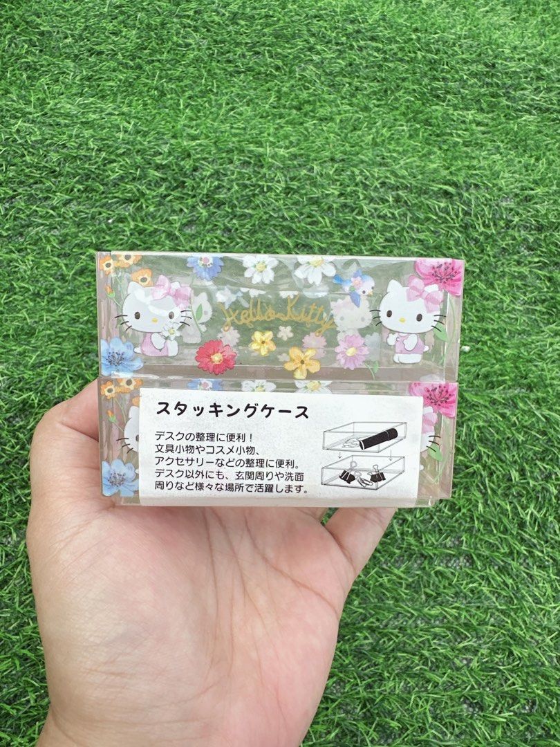 Sanrio Hello Kitty Floral Stacking Case Drawer Organizer (Category: Storage Boxes & Baskets) located in Manila. Submitted by ronoarabbit.ph (Listing ID 1468622128, Image 2). Description: ‼️old stock, from HT box, manage expectations‼️ - Official 2022 Sanrio merchandise featuring Kitty, flowers, and little blue birds - Two stackable drawers for organizing stationery, cosmetics, jewelry, or small desk items - Clear plastic design lets you easily se