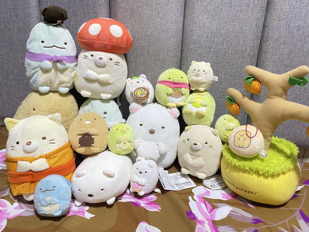 San-x Sumikko Gurashi Bundle Charm/Plush (Category: Plushies & Soft Toys) located in Los Banos. Submitted by chus.things (Listing ID 1468638892, Image 1). Description: Wysiwyg 1 cut tag - tokage purse 1 unsure if official or not - shiro mallow (laying down) The rest all have readable plush tag some have paper tags.