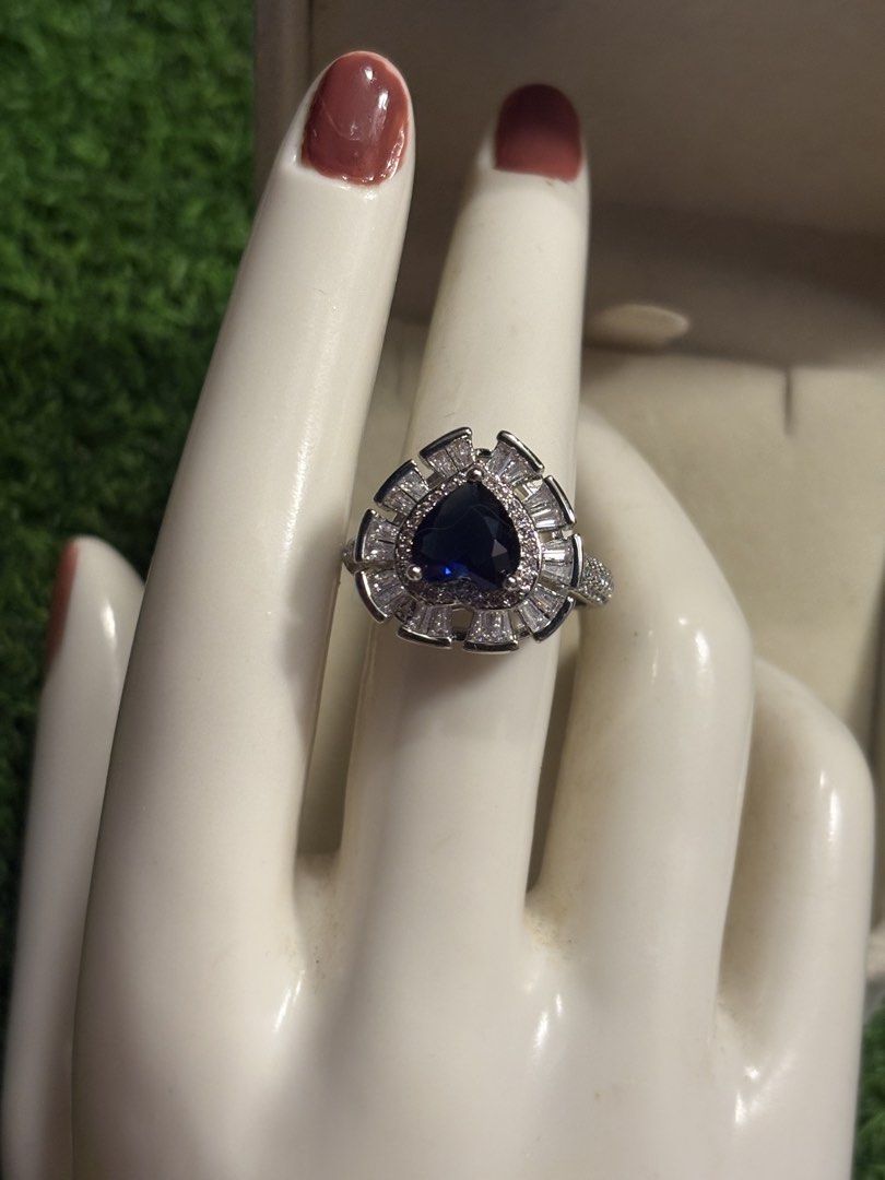 Sapphire heart ring gemstone (Category: Rings) located in Davao. Submitted by emmanuelchuamellorin23 (Listing ID 1468668361, Image 3). Description: 💙Sapphire heart ring with uv reactive side stones. Size7 not adjustable Markings Au750 2.00ct Rodium/ Platinum over copper based metal Tarnish resistant with extra care Message me directly📩.