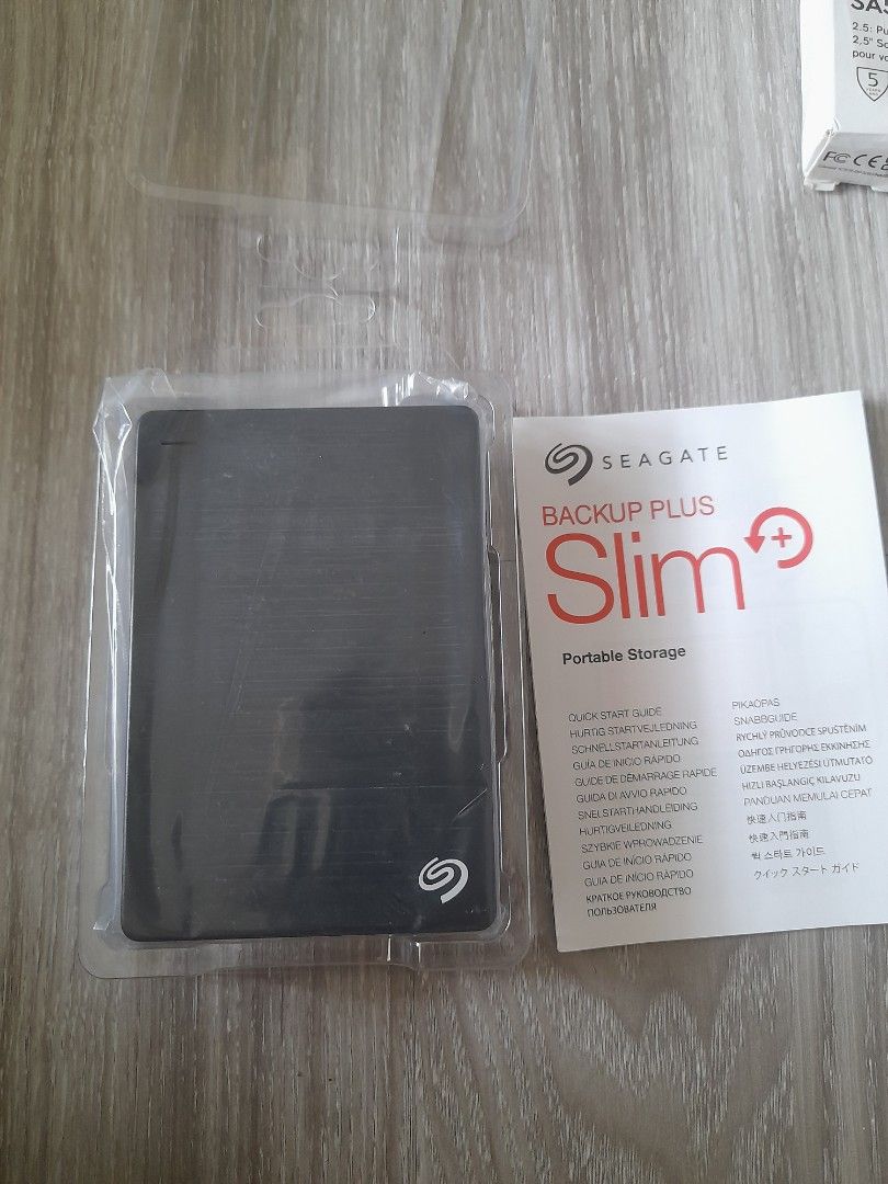 Seagate Backup Plus Slim 2TB Portable External Hard Drive (Category: Hard Disks & Thumbdrives) located in Quezon City. Submitted by jdmagallanes29 (Listing ID 1468560716, Image 2). Description: - Brand: Seagate Backup Plus Slim - Capacity: 2TB - Color: Black - Condition: Like new (unboxed for photos only, never used) - Inclusions: Original retail packaging and quick start guide - Features: Slim and portable design, fast file/photo/video backup.