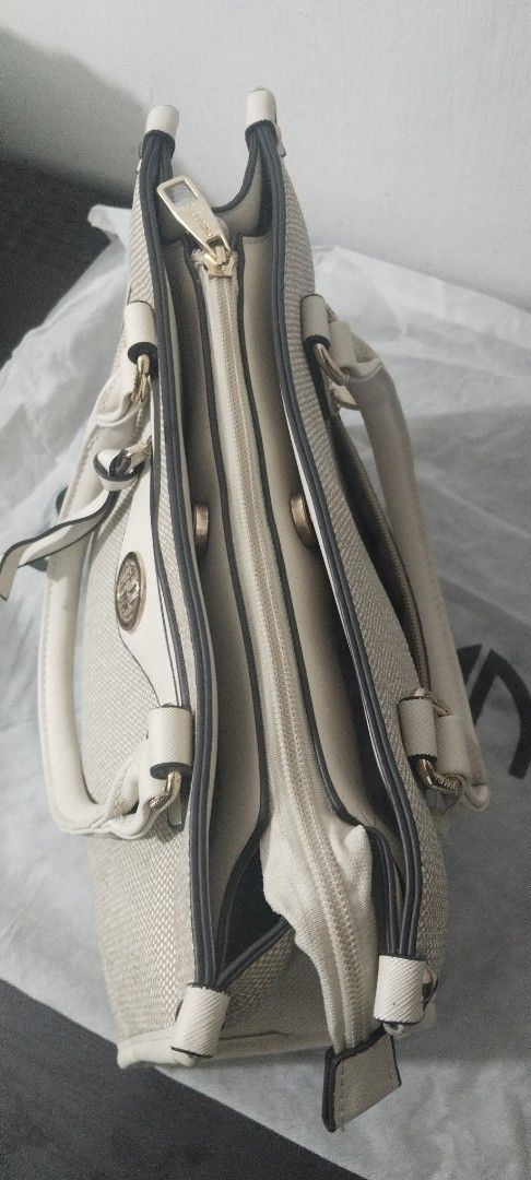 SECOSANA Tote/ Shoulder Bag (Category: Shoulder Bags) located in Marikina City. Submitted by jhazielle (Listing ID 1468513259, Image 2). Description: FOR SALE‼️ SECOSANA BAG ✅Style: Yelessi structured tote / shoulder bag ✅3 compartments with Exterior back and front zip pocket - interior 1 zip pocket and 2 slip-in pockets. ✅Comes with a dust bag. ✅Condition: Excellent, Good as new(used twice lang) well-maintained ✅ Original Price when bought Php 2