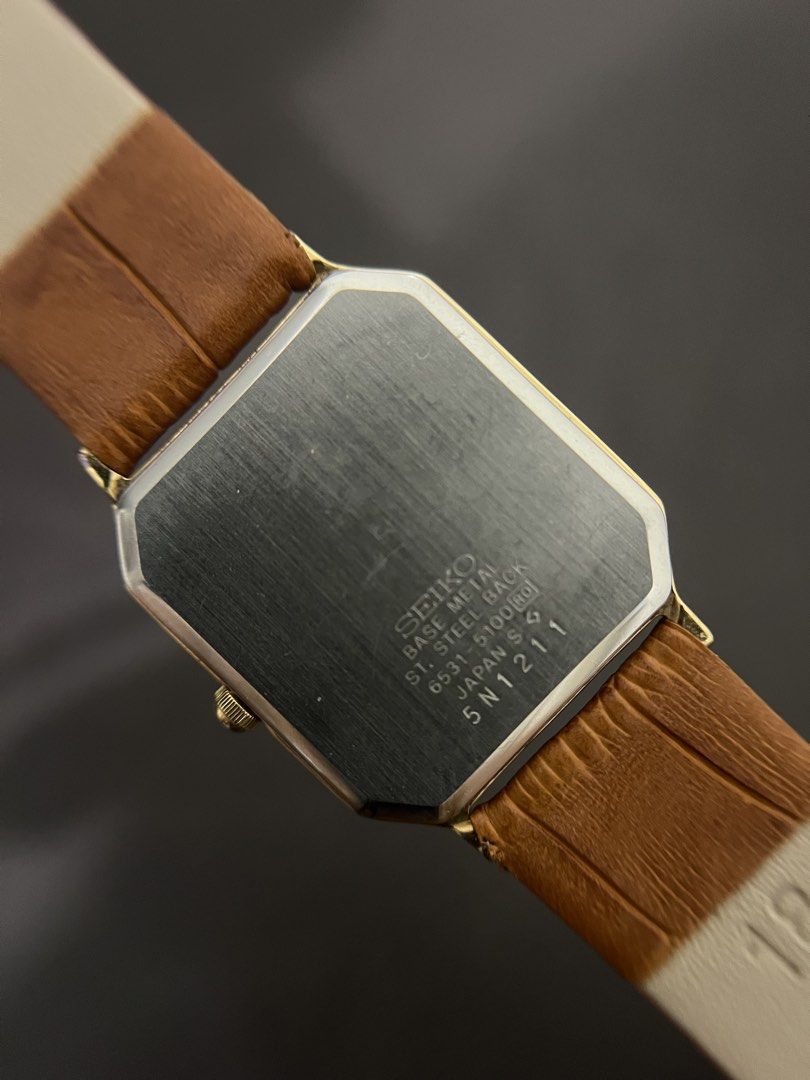 Seiko Gold Dial Octagonal Tank Quartz – Ref. 6531-5100 (Category: Men's Watches) located in Quezon City. Submitted by bobby.brown. (Listing ID 1468507577, Image 2). Description: Seiko Gold Dial Octagonal Tank Quartz – Ref. 6531-5100 Estimated BMBY: November 1985 A refined vintage dress watch from Seiko, featuring a distinct octagonal tank-style gold-tone case with a sleek, minimalist profile. The warm champagne-gold sunburst dial is styled with a