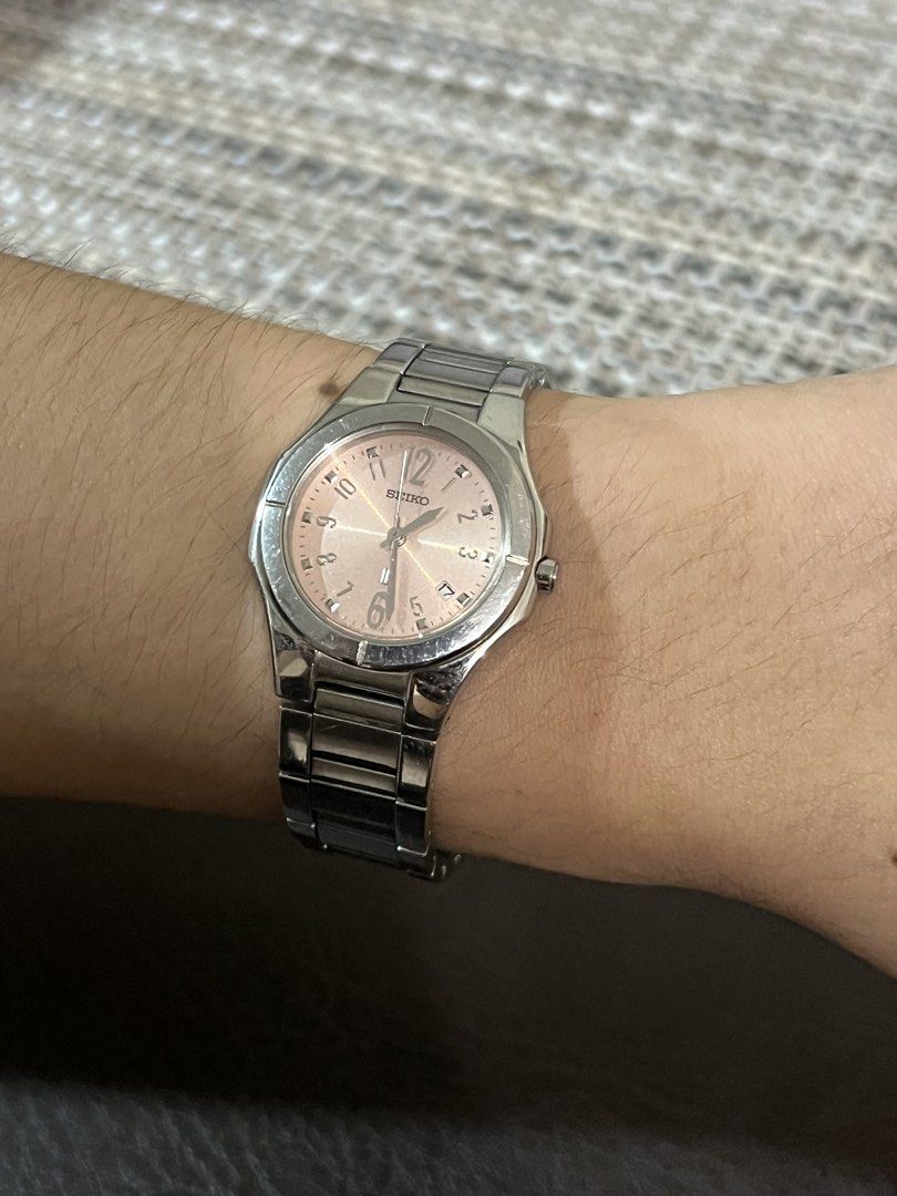 Seiko Lukia Pink Dial Quartz – Ref. 7N82-0AX0 (Category: Women's Watches) located in Quezon City. Submitted by bobby.brown. (Listing ID 1468508363, Image 3). Description: Seiko Lukia Pink Dial Quartz – Ref. 7N82-0AX0 Estimated BMBY: September 2003 A charming modern dress watch from Seiko’s popular Lukia collection, featuring a polished stainless steel case with contoured bezel tabs and a matching integrated stainless steel bracelet. The subtle bl