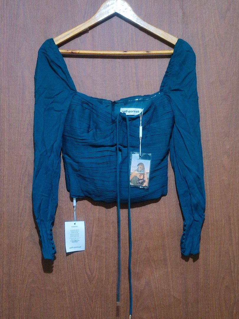 Self portrait Slate Stretch Crepe Cut Top (Category: Blouses) located in Pasig City. Submitted by supremokicksmanila (Listing ID 1468548584, Image 1). Description: Self portrait Slate Stretch Crepe Cut Top 15x21 excellent condition 2999 shipped dm to purchase lalamove within metro j&t outside metro no return and exchange policy.