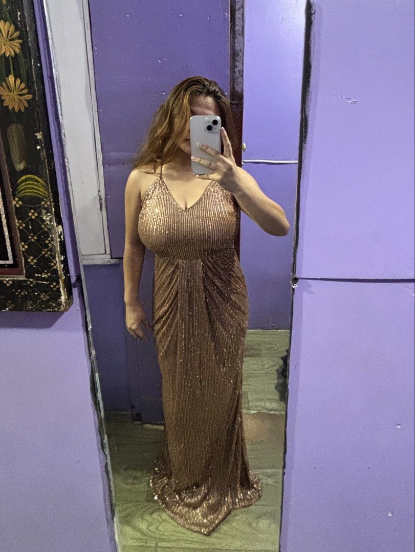SHEIN Bronze Shimmer Maxi Dress ✨ (Category: Evening dresses & gowns) located in Manila. Submitted by nutonewhalo (Listing ID 1468672513, Image 3). Description: Selling this gorgeous bronze-brown shimmer maxi dress from SHEIN! Perfect for formal events, weddings, evening parties, birthdays, and special occasions. Features a flattering fitted silhouette, delicate spaghetti straps, a beautiful shimmering finish, and an elegant floor-length design. 